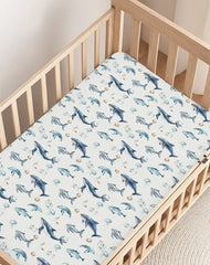 Woodiville stain-concealing design pattern on pack n play sheet.