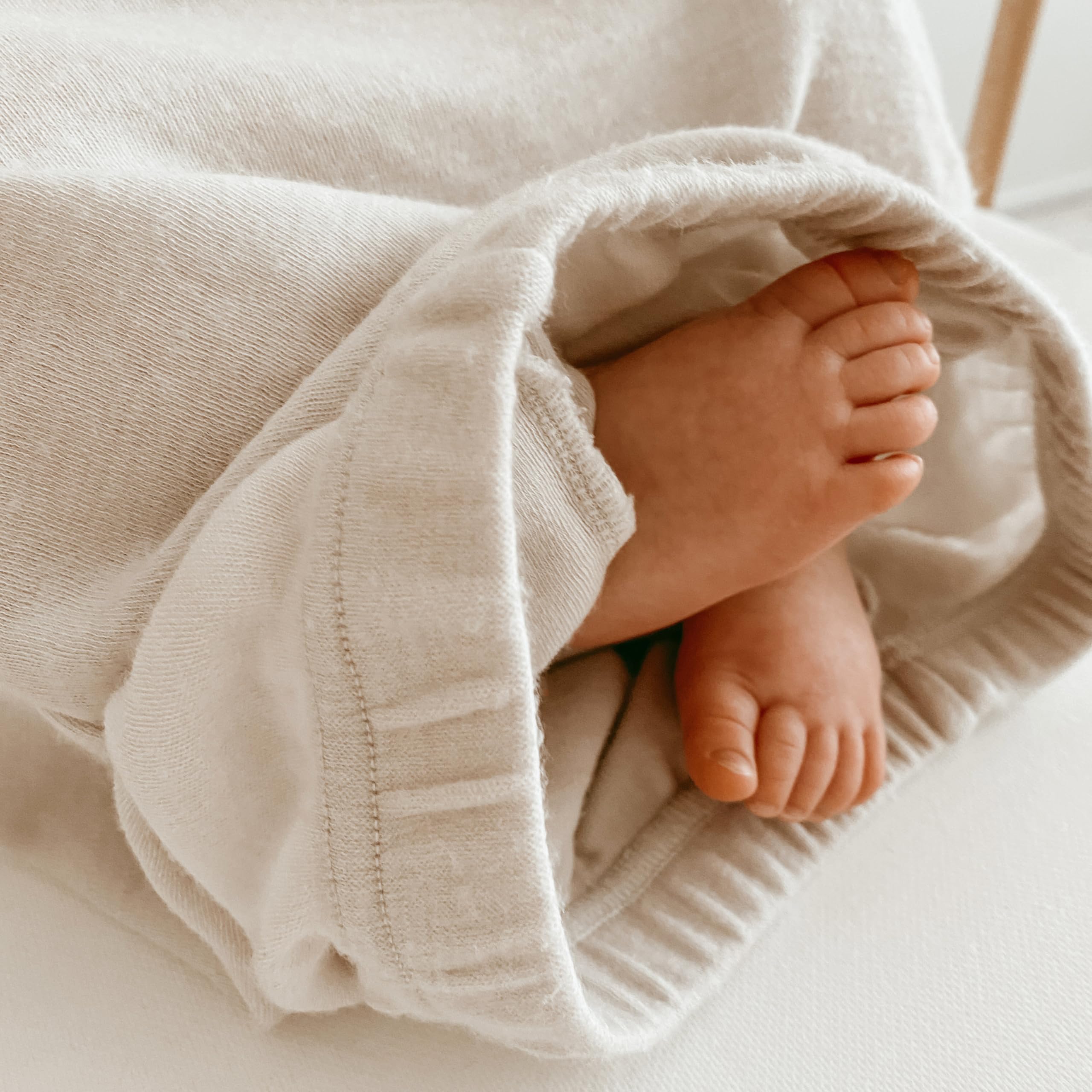 Woolino infant nightgown beige color highlights Merino warmth and breathability.