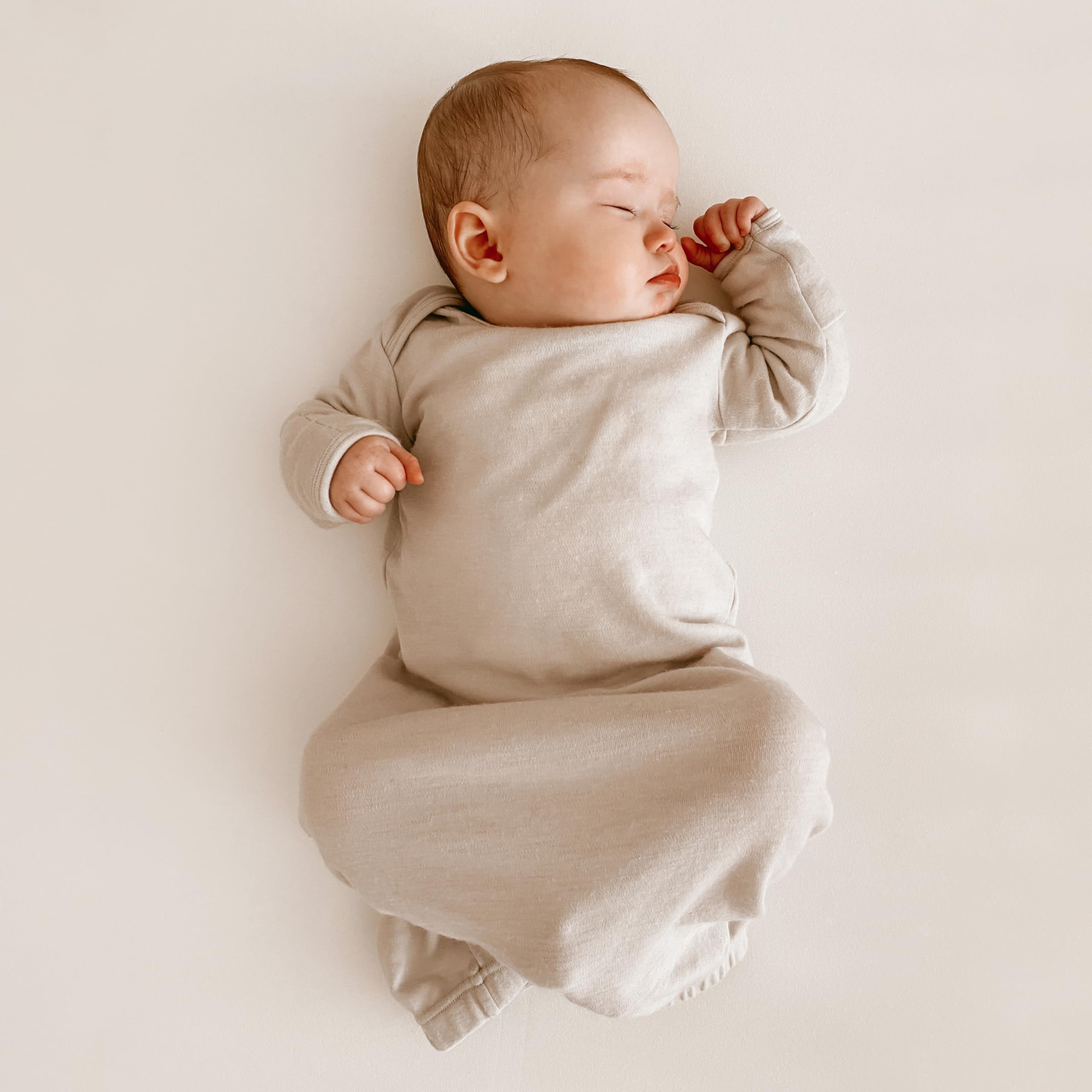 Woolino infant nightgown envelope neck demonstrates easy dressing for night-time routines.