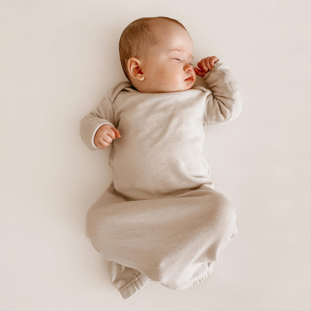 Woolino infant nightgown envelope neck demonstrates easy dressing for night-time routines.