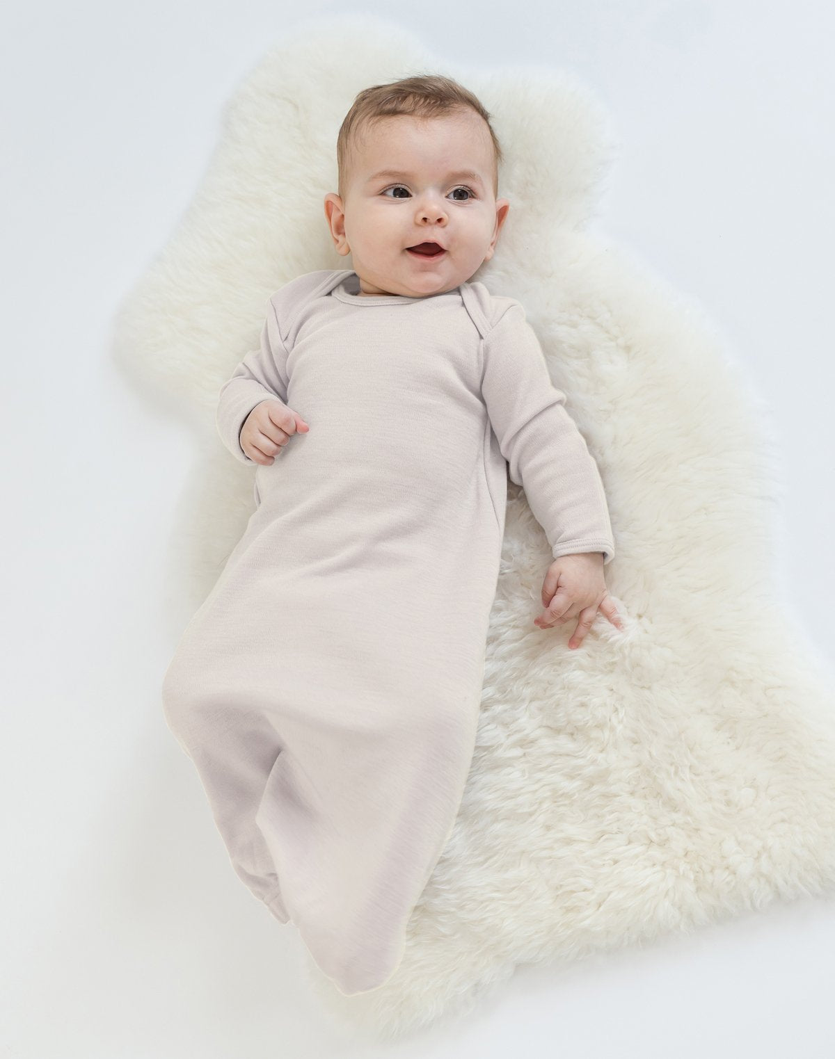 Woolino merino fiber closeup emphasizes silky softness against skin.