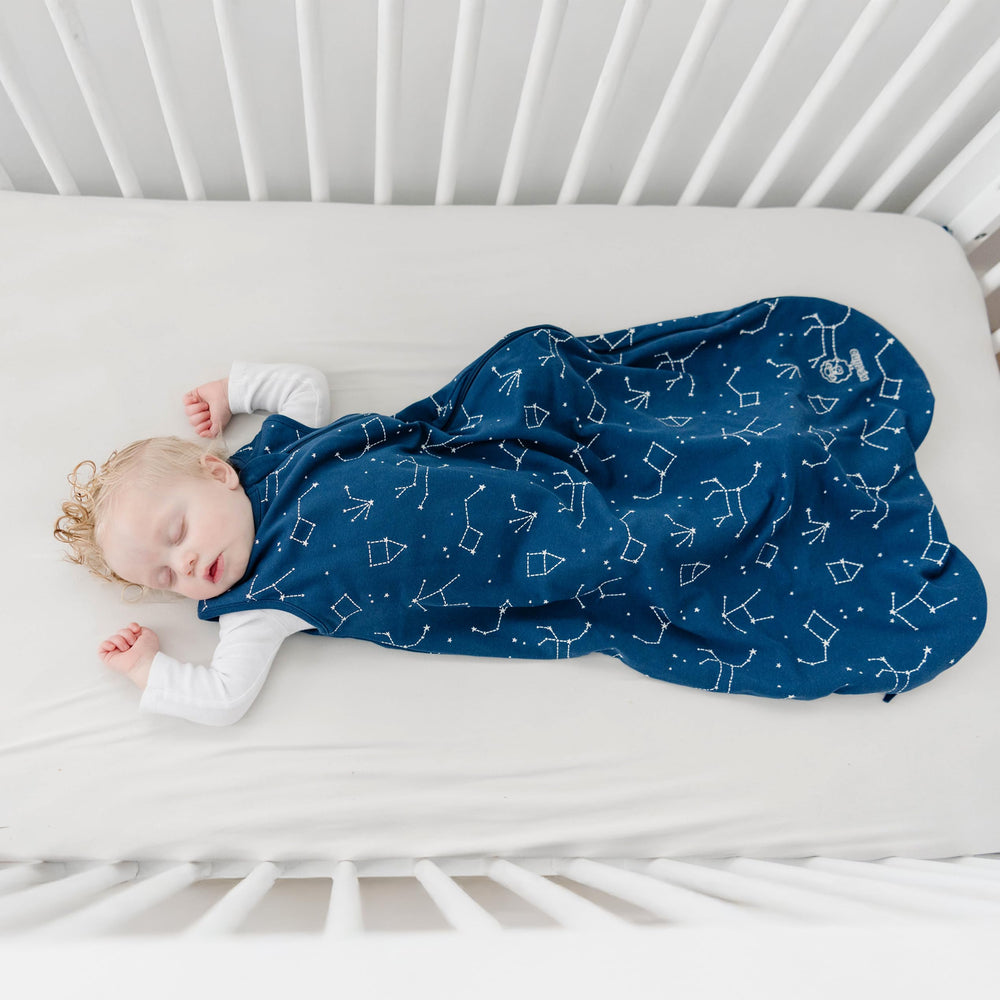 Woolino Merino sleep bag Night Sky on baby demonstrates roomy, comfy fit.