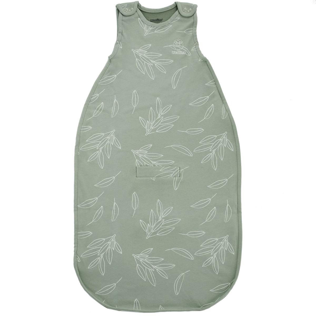 Woolino Merino Ultimate Sleep Sack in Sage shown on crib for year round comfort.