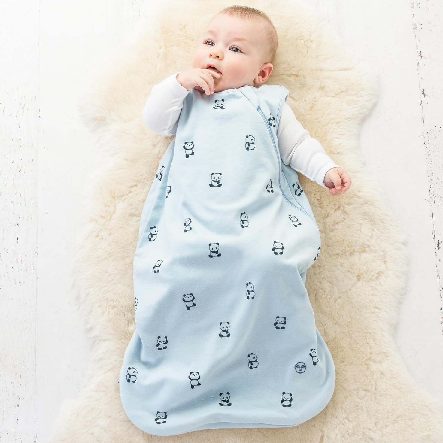 Woolino sleep bag zipper guards protecting baby's skin.