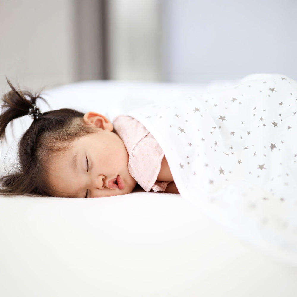 Woolino Toddler Blanket On Baby Snuggle close-up captures gentle warmth for cozy naps