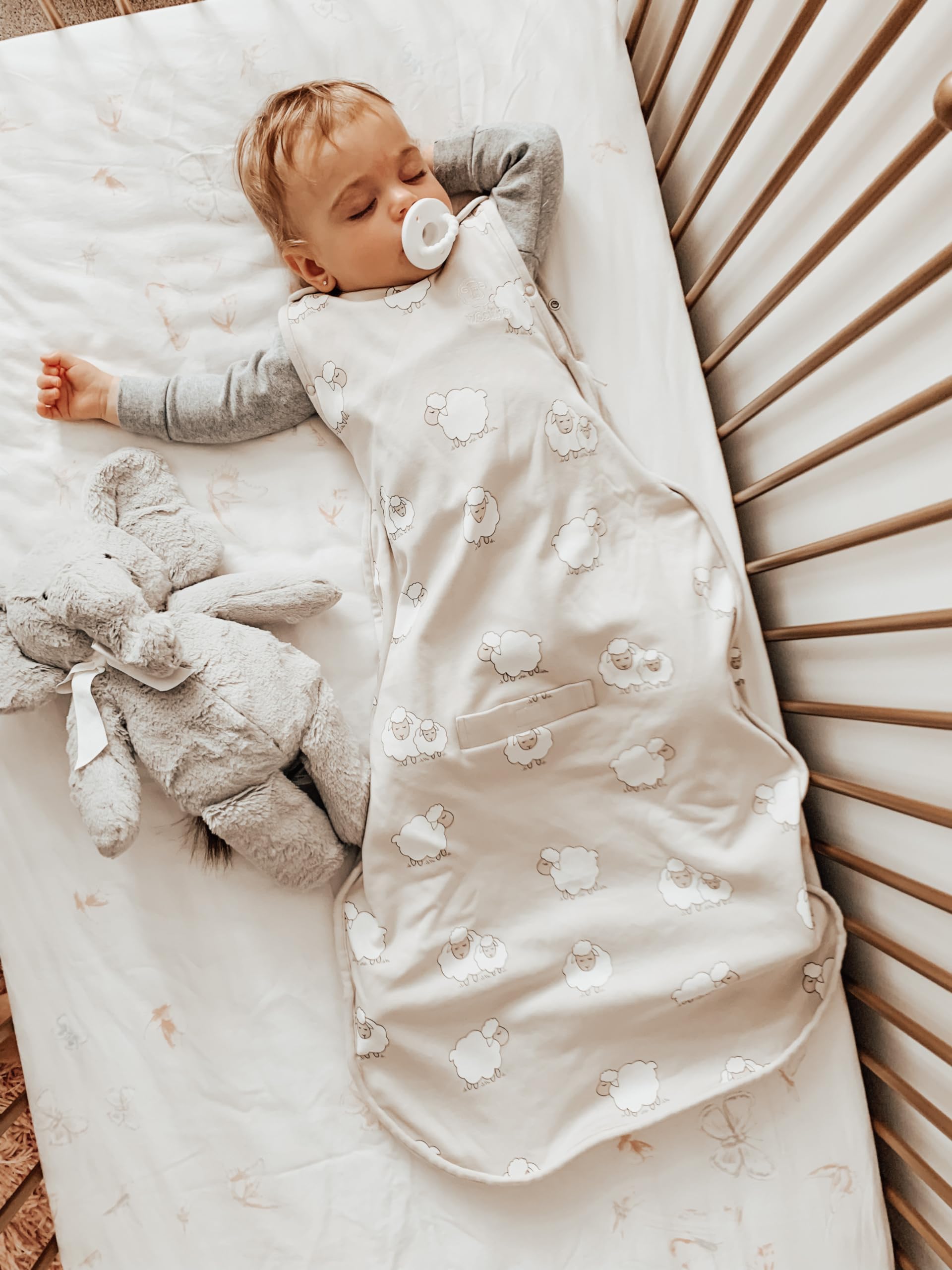 Woolino under-arm snaps demonstrate growth adaptability for toddlers.