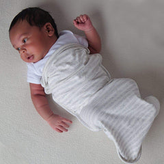 Arms-out option supports rolling, play, and stroller use.