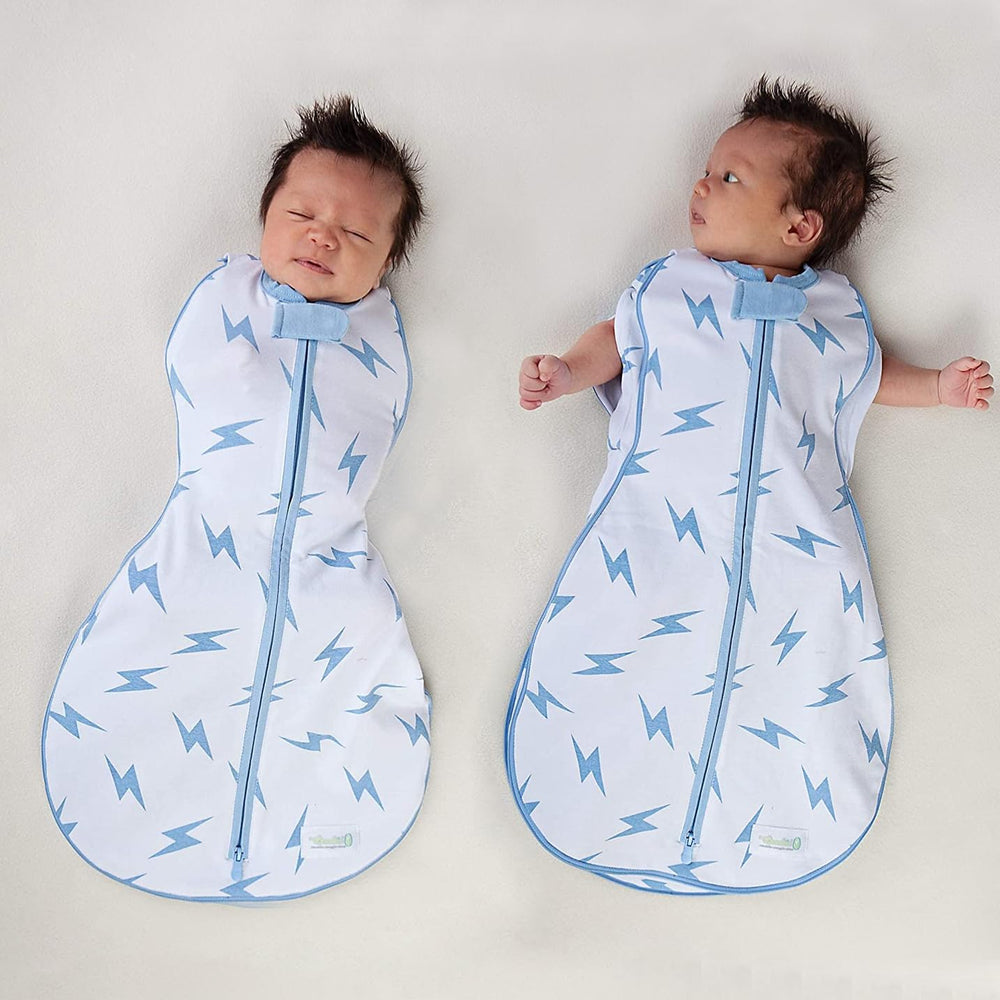 Woombie Grow With Me Stage One swaddle shows adjustable fit as your baby grows.