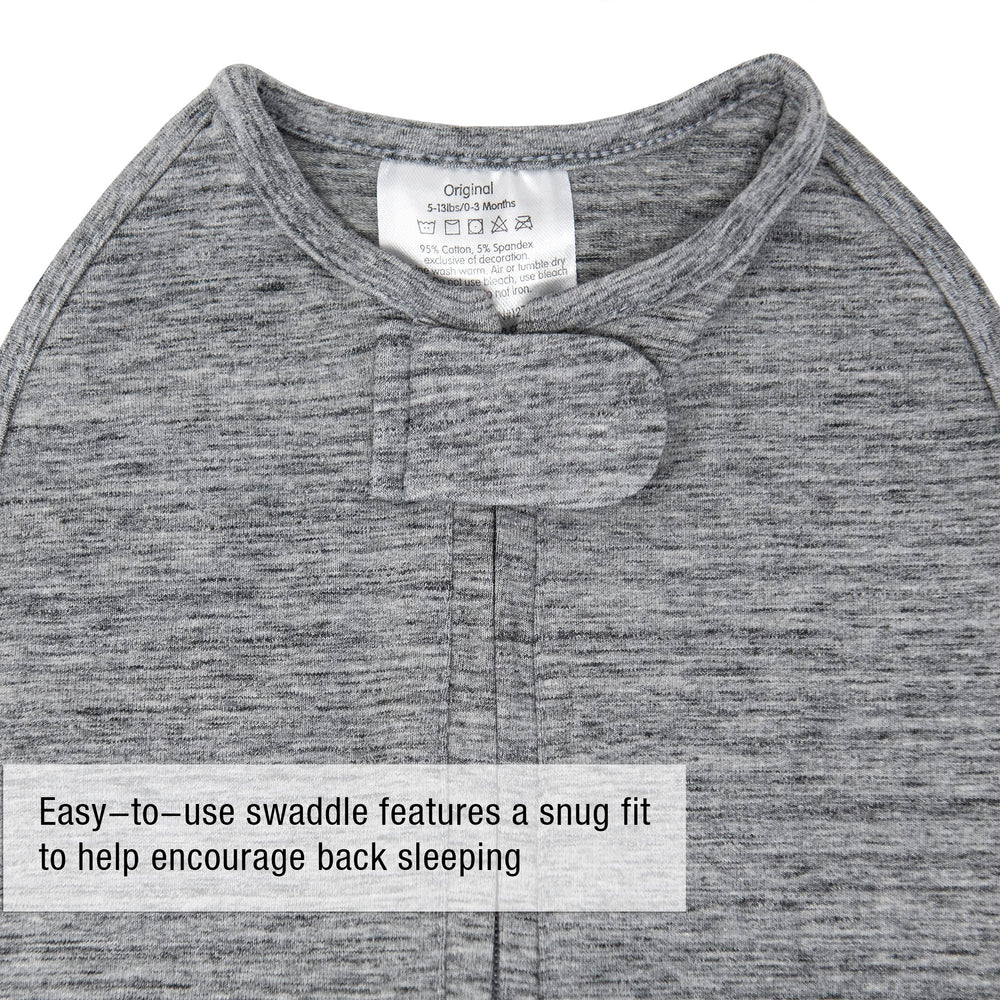 Woombie Twilight Gray color swaddle on baby