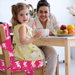 wooshwa Unicorn booster seat shows adjustable straps for secure seating.