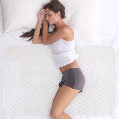 WOVENX organic bed protector pad for kids in 34x52 keeps sheets dry overnight.