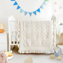 Wowelife 3-piece beige crib bedding set on a crib for a cozy nursery.