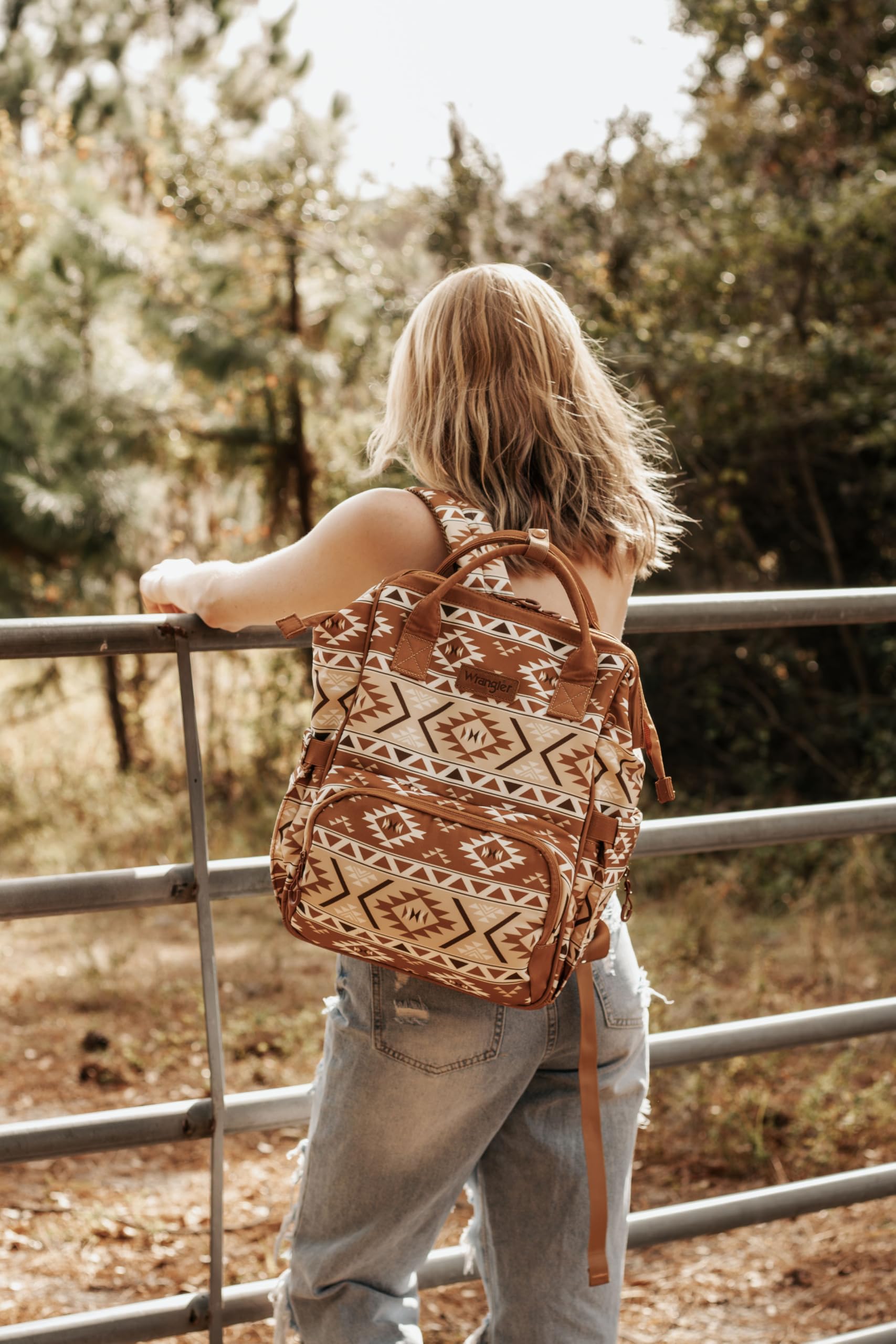 Wrangler Aztec Backpack adjustable padded straps ensure comfort during travel.