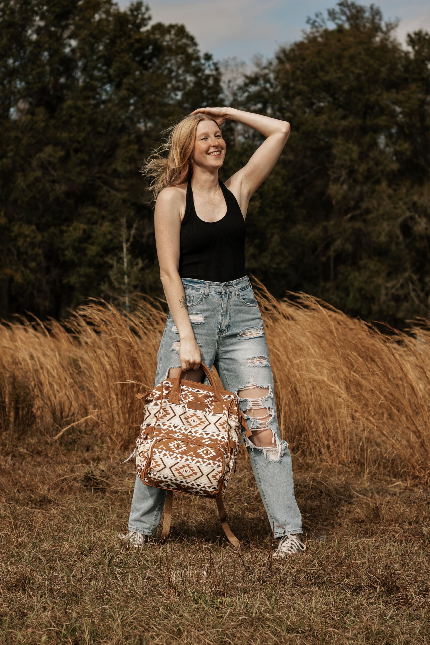 Wrangler Aztec Backpack showing stroller straps for hands-free travel.
