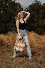 Wrangler Aztec Backpack showing stroller straps for hands-free travel.