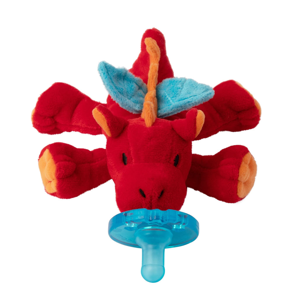 WubbaNub pacifier close-up shows silicone teat and dragon plush for easy grasp.