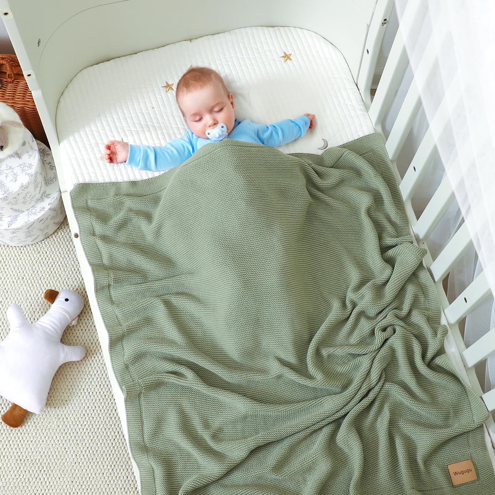 Wugugu baby blanket in stroller for on-the-go warmth and comfort