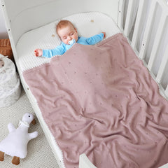 Wugugu baby knit blanket on stroller for cozy outings
