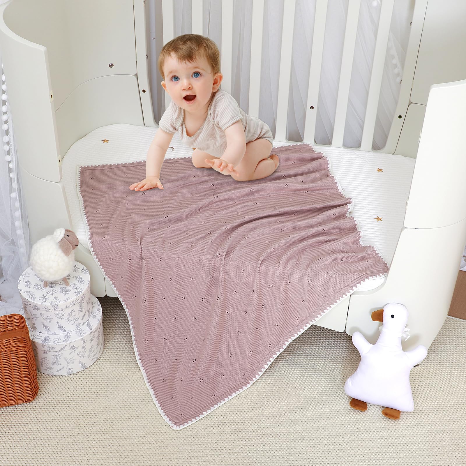 Wugugu knit blanket in unisex colors fits any nursery