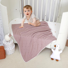 Wugugu knit blanket in unisex colors fits any nursery