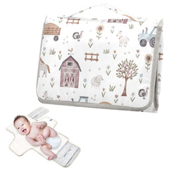 Xigua portable baby changing pad unfolded, ready for diaper changes.