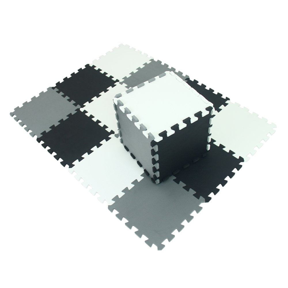 XMTMMD interlocking foam tiles forming a colorful puzzle play area for kids.