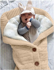 XMWEALTHY swaddle fabric texture close-up highlighting soft fleece feel.