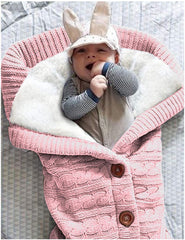XMWEALTHY swaddle with wooden buttons providing a snug fit for quick changes.