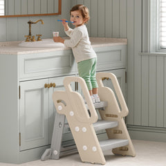 XQIAO foldable step stool beside the bathroom sink supports toddlers safely.