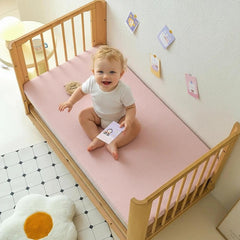 360° encased elastic on Xuan Dian crib sheet keeps it in place