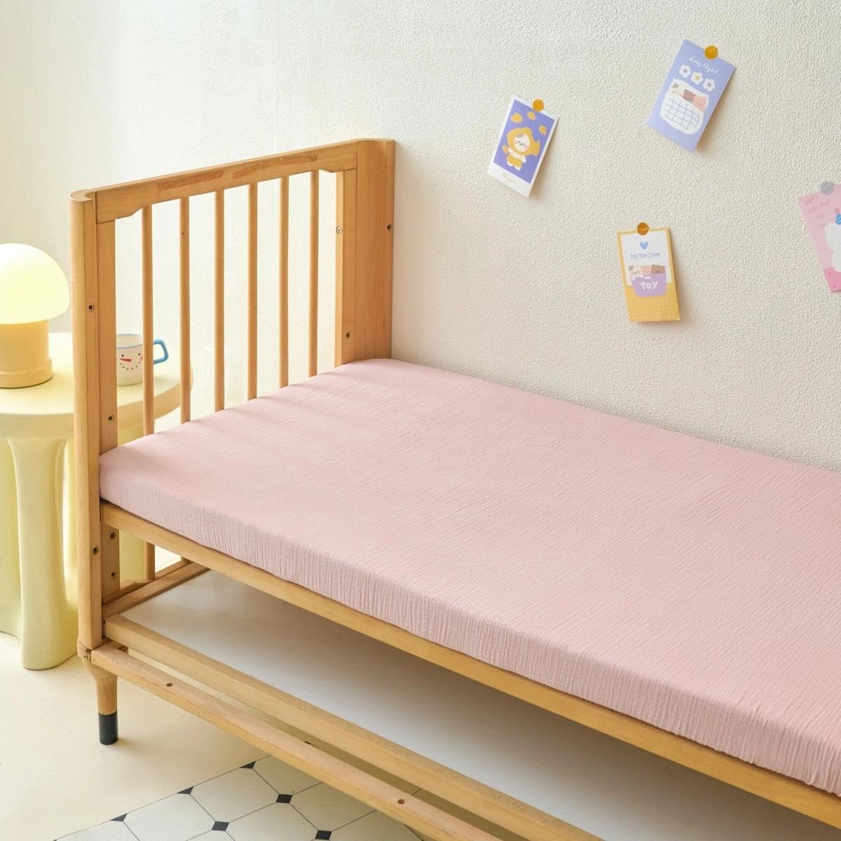 Two-pack Xuan Dian muslin sheets provide easy rotation for busy parents