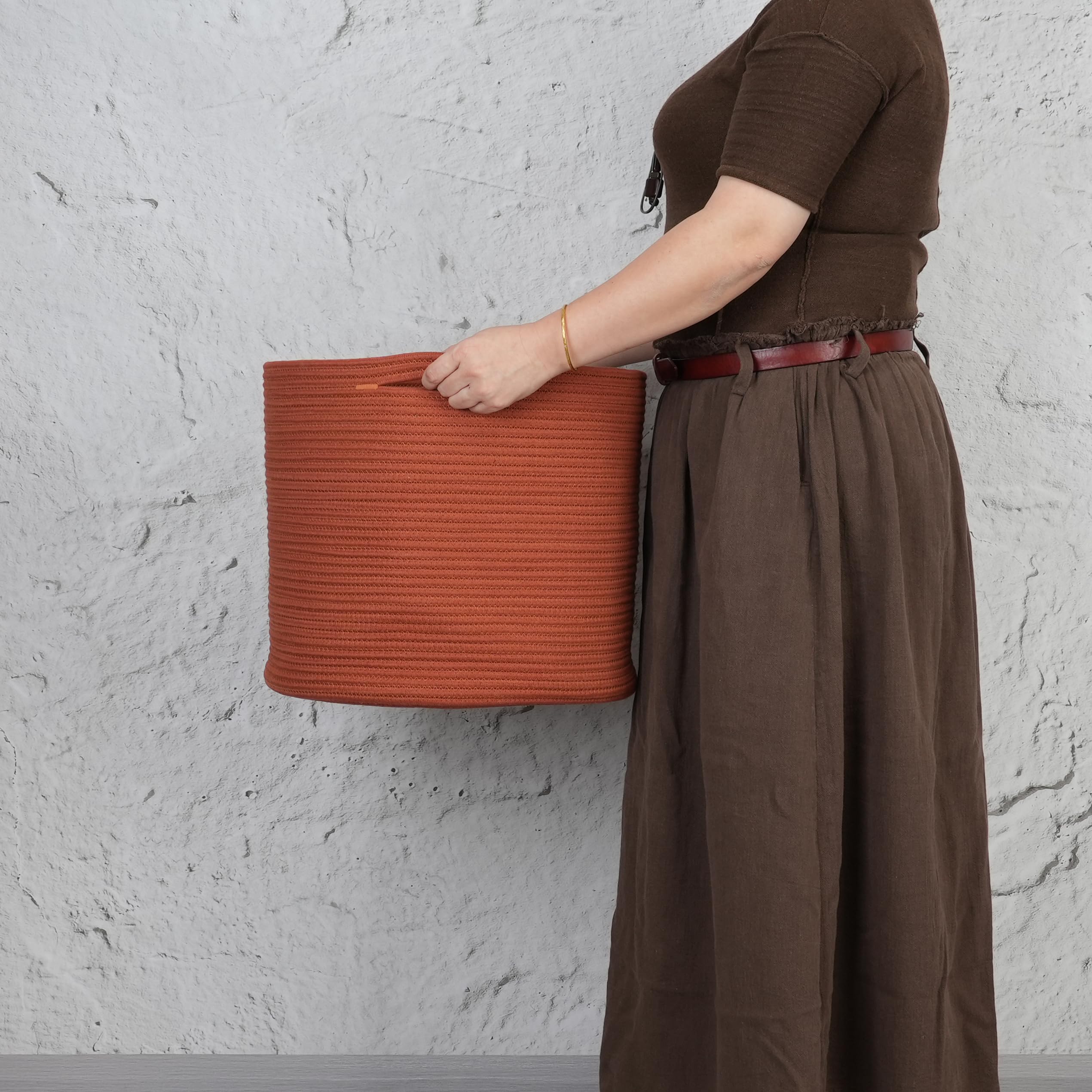 XUANGUO decorative basket complements nursery decor while organizing everyday items.