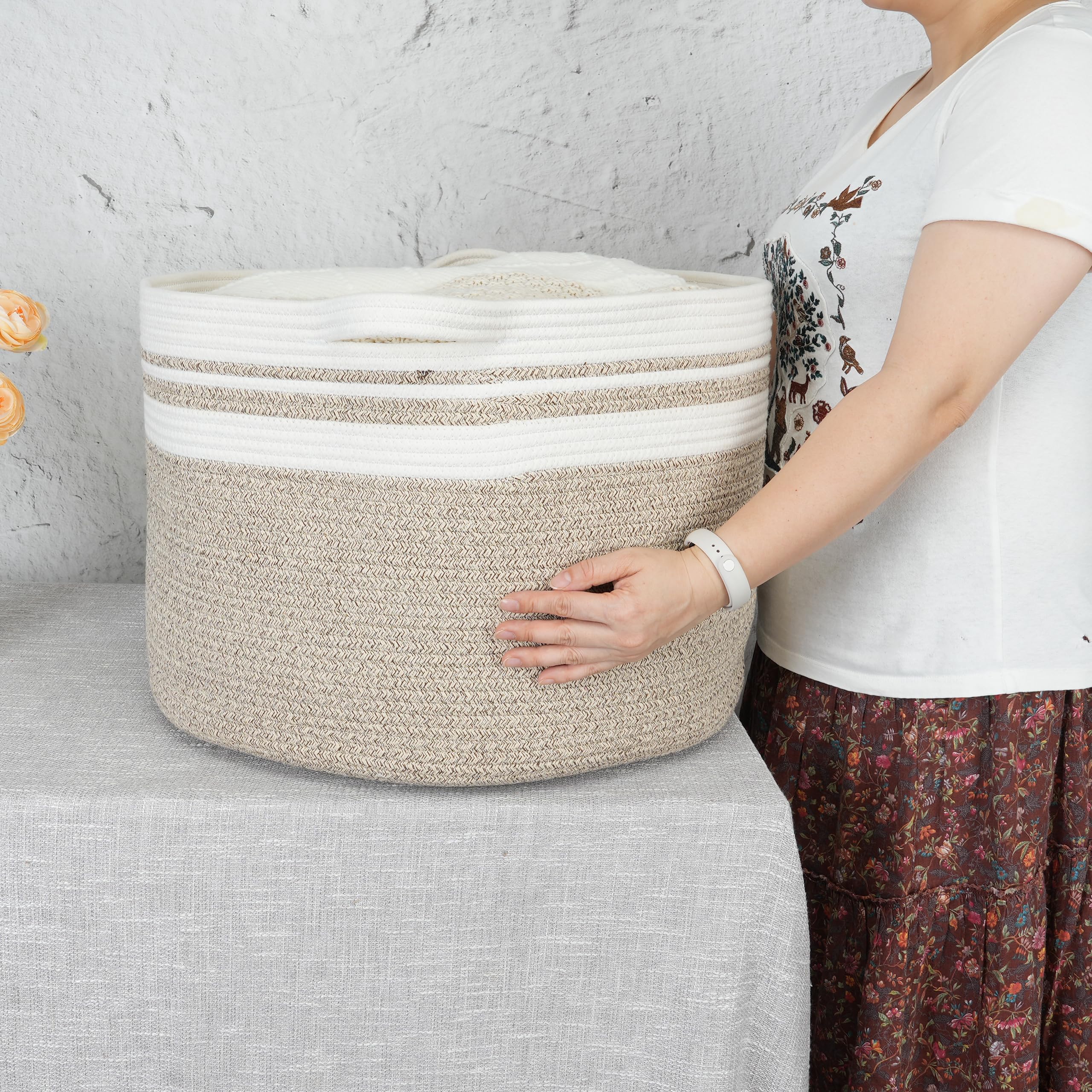 XUANGUO cotton rope basket as a laundry hamper for towels.
