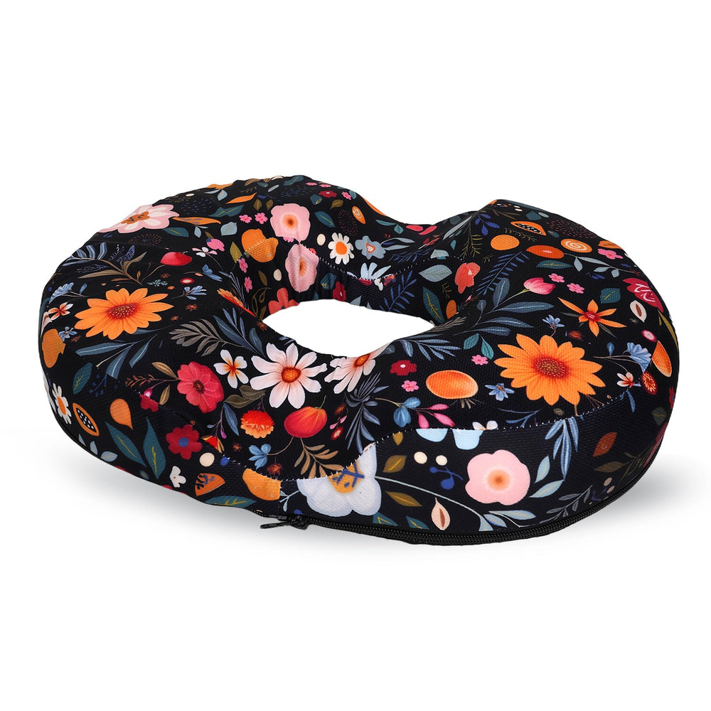 XUEHUAPIAOPIAO floral donut pillow on chair cushion offering tailbone relief during long workdays.