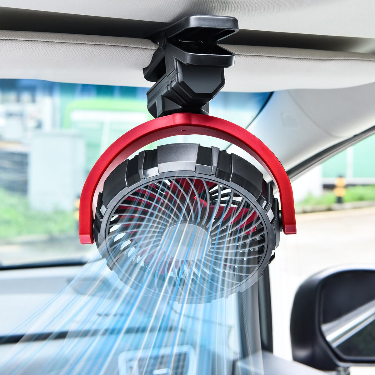 xuenair battery powered clip-on fan attached to car visor delivers refreshing airflow