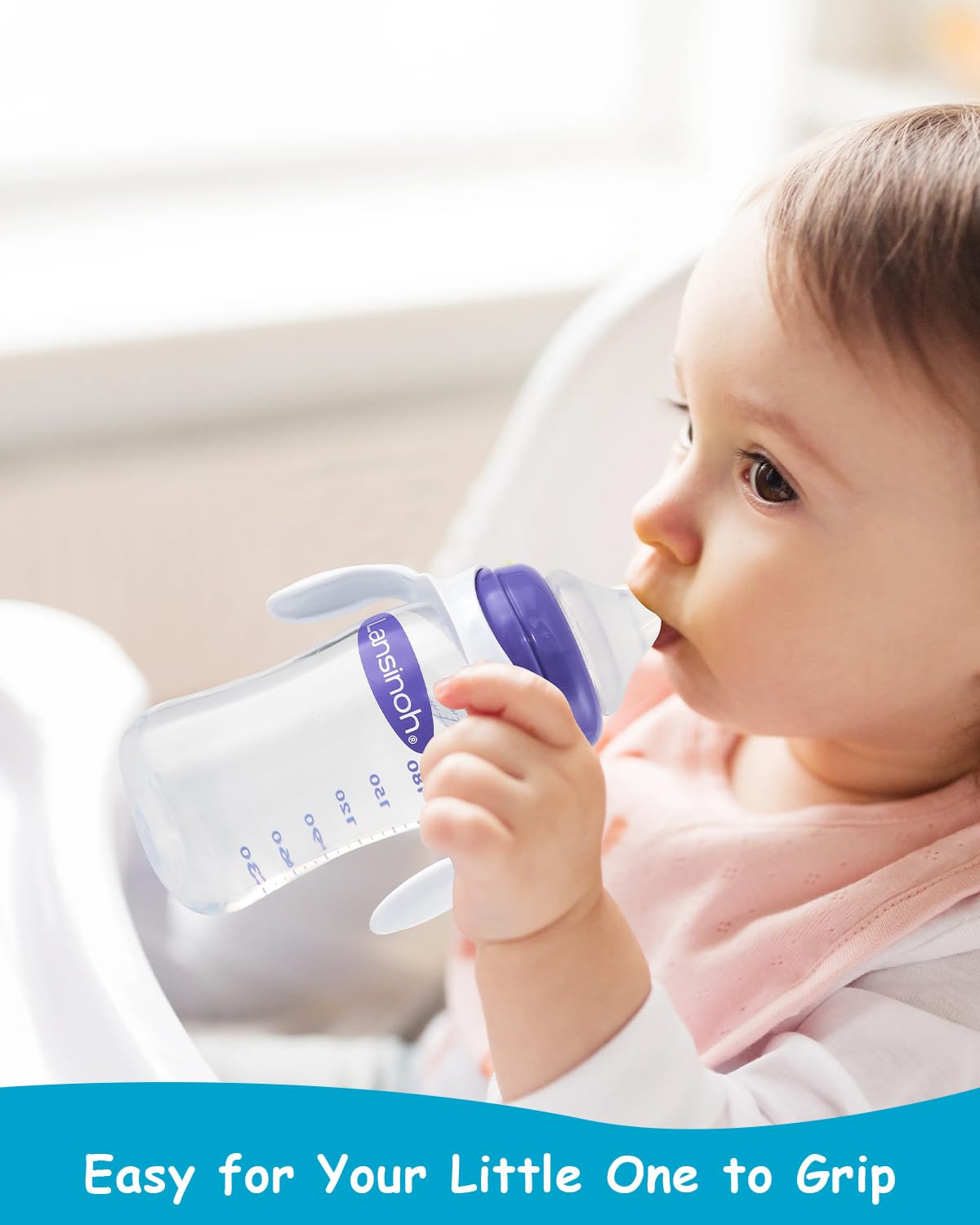 XUNICUTE ergonomic grips on Lansinoh bottle for newborn feeding.