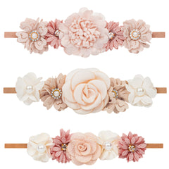 XuoAz baby girls floral headbands set, three-pack, soft fabric for gentle newborn comfort.