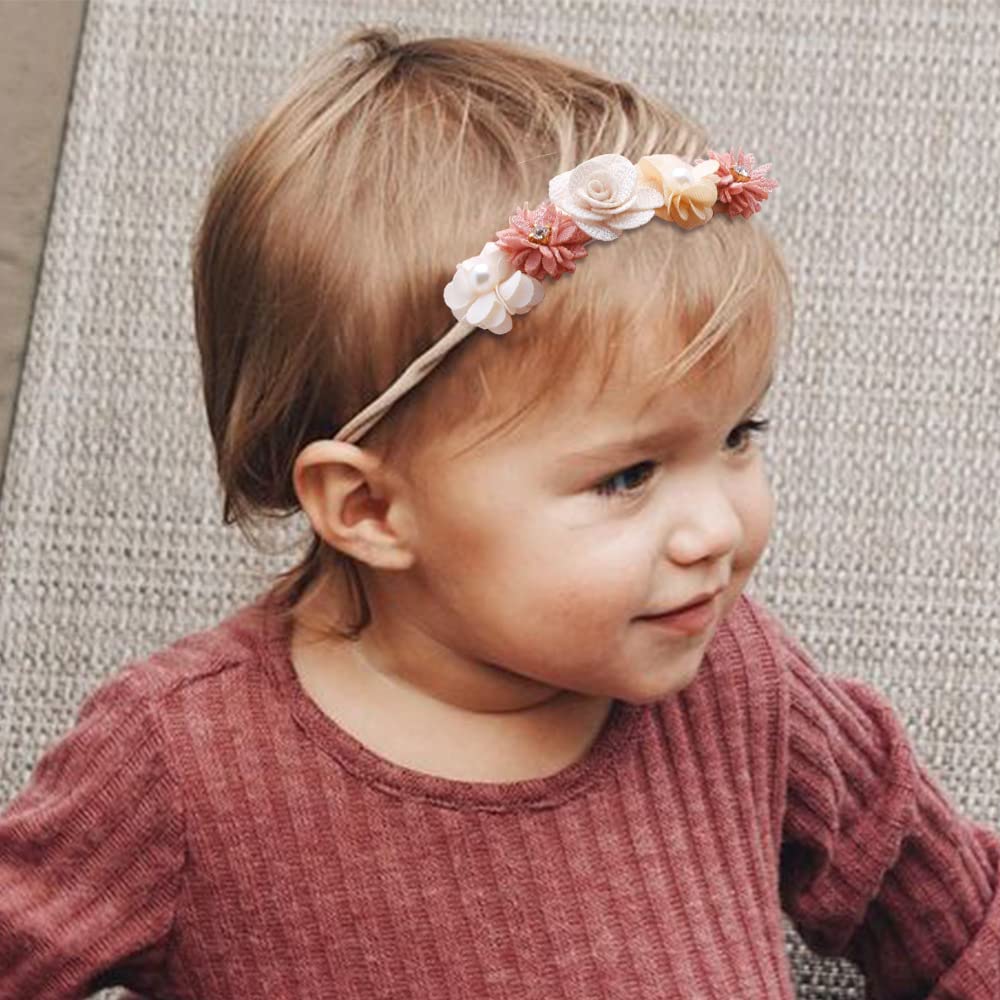 XuoAz elastic baby headband with rhinestones adds subtle sparkle for special occasions.