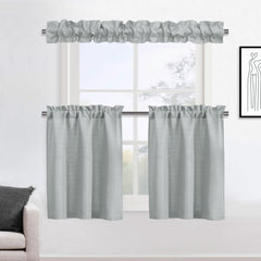 XWZO Sleeve Topper with ruffle footer softens a dining area and adds charm.