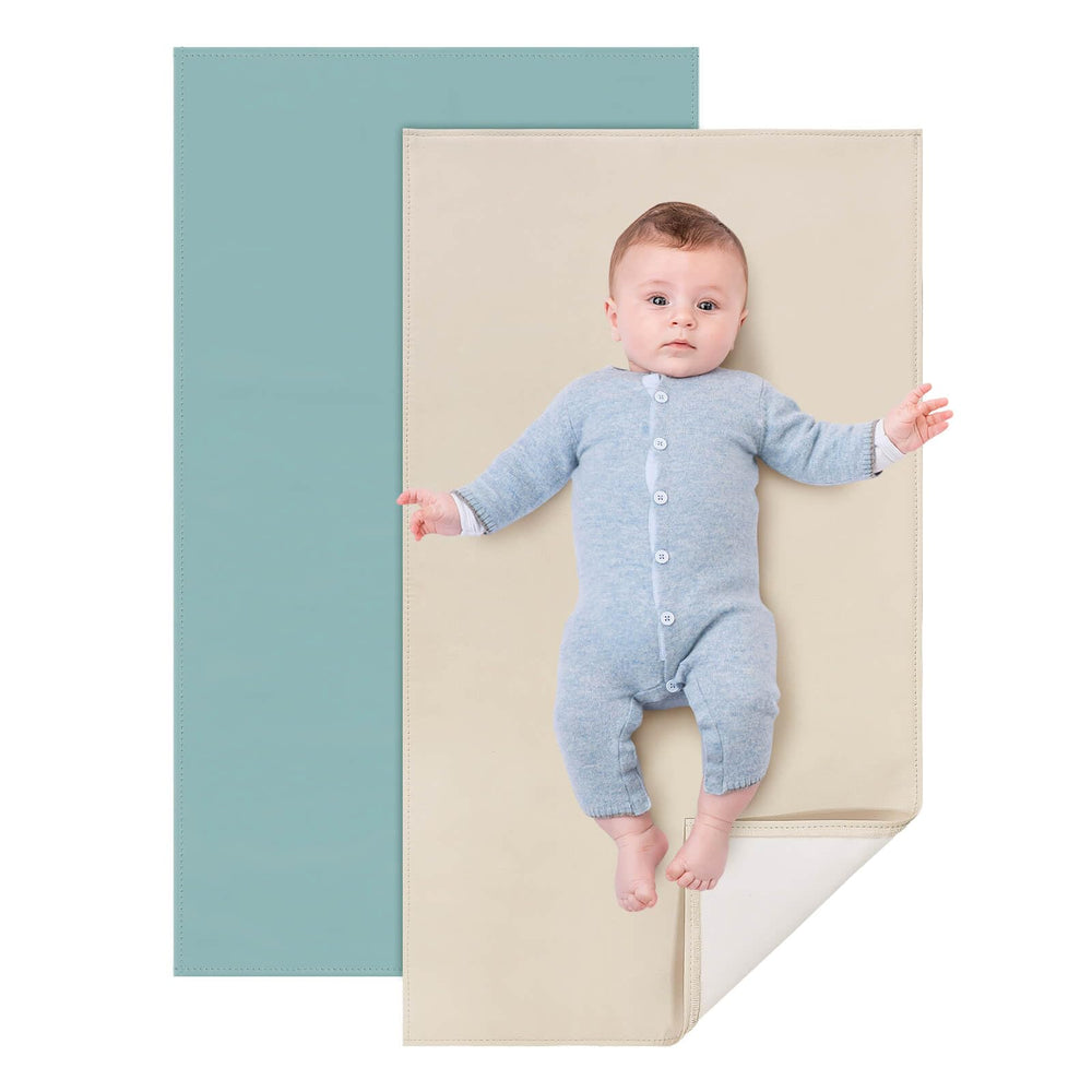 YACODAVO leather changing mat folded to palm size for on-the-go diaper changes.