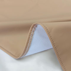 YACODAVO leather changing mat unfolded to 30 by 17 inches for spacious changes.
