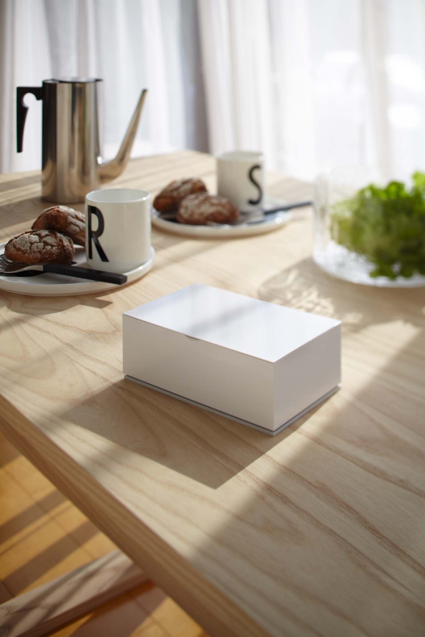 Compact form fits neatly in narrow shelves and counters.