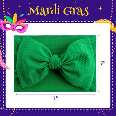 YanJie 7-inch baby bow in green, bold statement for outfits.