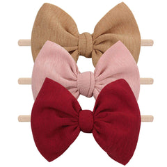 YanJie red knotted bow headband for newborn outfits, comfy and adorable.