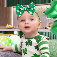 YanJie clover-printed baby bow adds playful charm to outfits.
