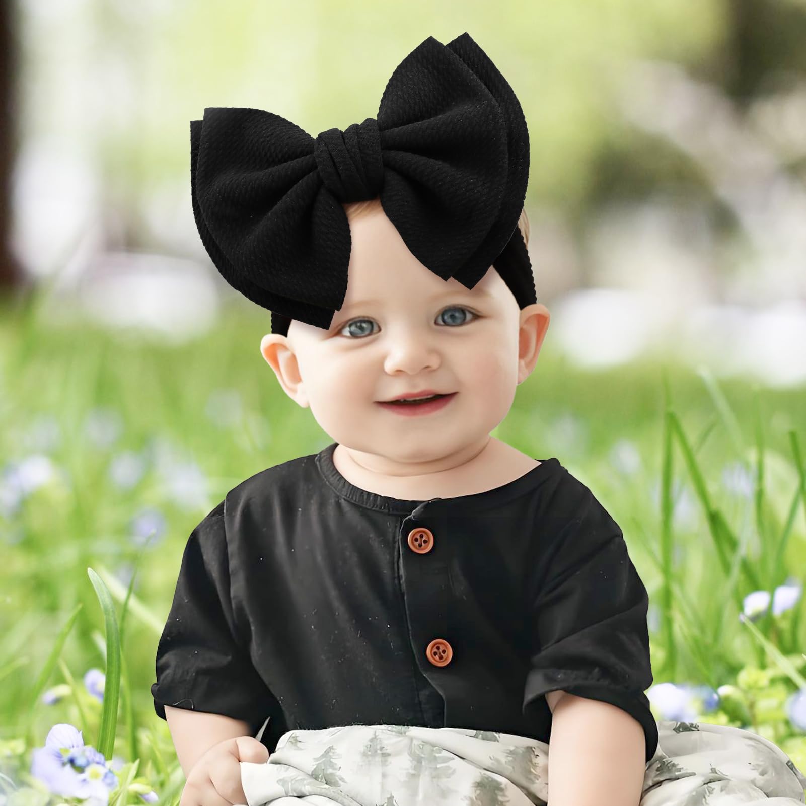 YanJie headband on a baby wearing red bow, ideal for photoshoots