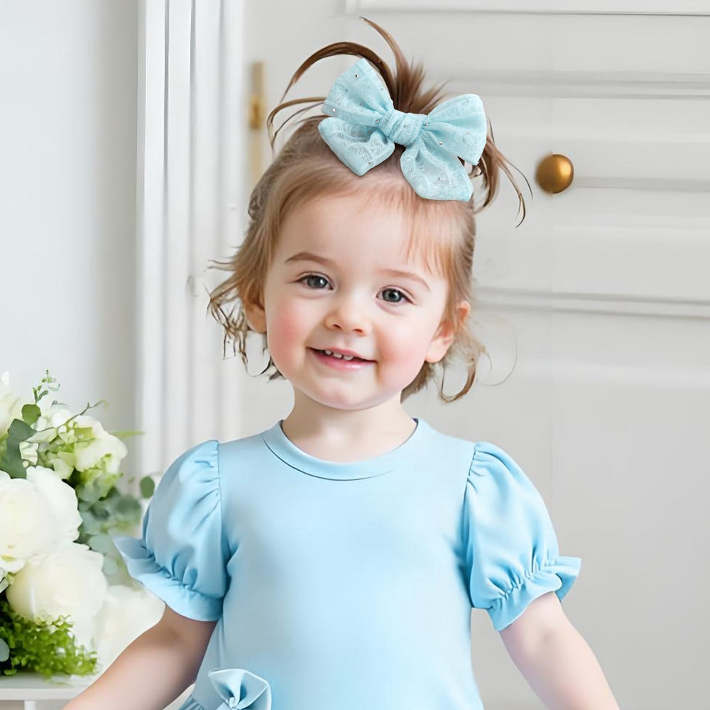 YanJie lace bow clip in light blue enhances party-ready looks with rhinestones.