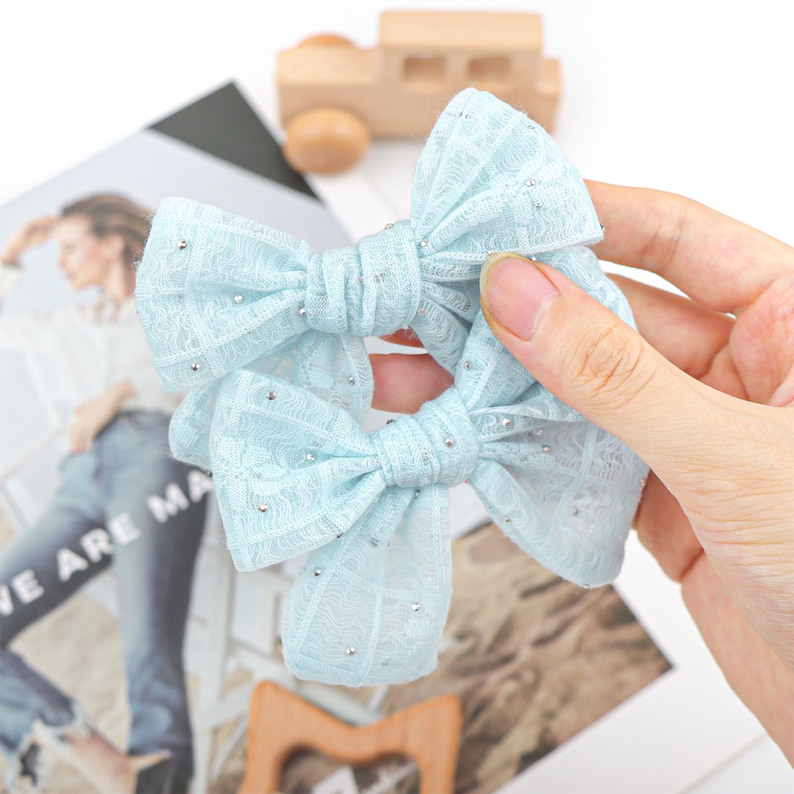 YanJie lace bow clip pairs with party outfits for a polished look.