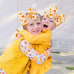 YanJie maple leaf pumpkin printed bows add festive charm for infants and toddlers.