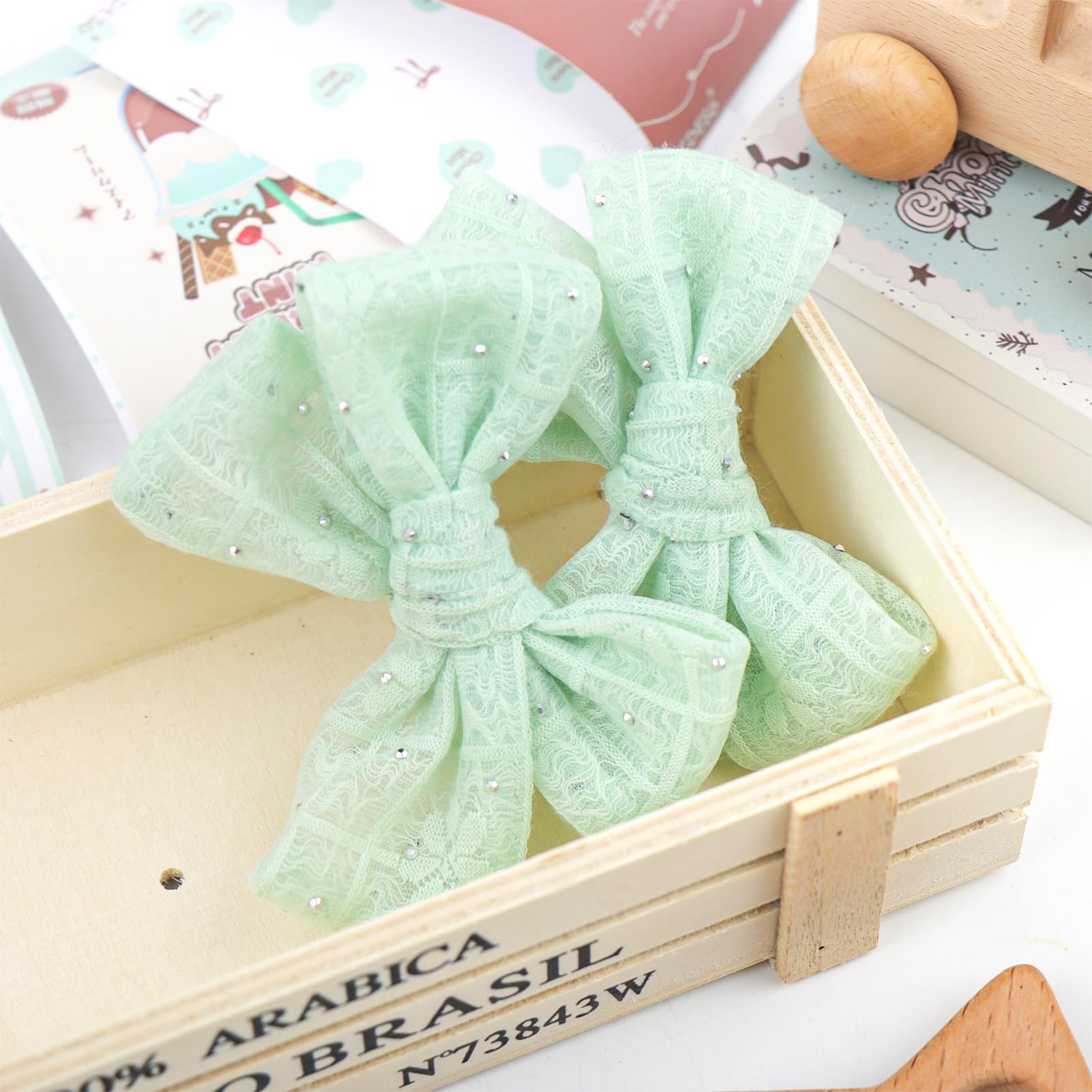 YanJie mint green lace bow close-up, craftsmanship visible